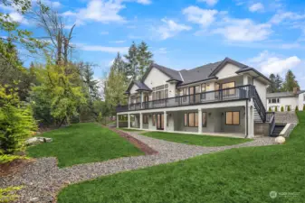 A day-time perspective of the whole house highlighting indoor/outdoor living.