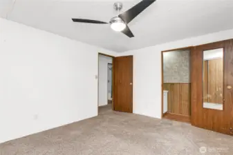 Primary bedroom with 1/2 bath