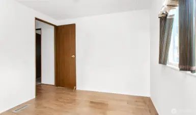Office/second bedroom has nice laminate flooring.