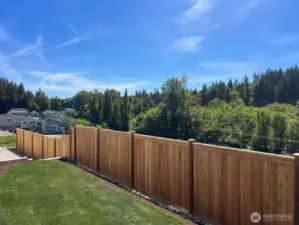 Enjoy rare unobstructed views of Evergreen trees and sunsets.