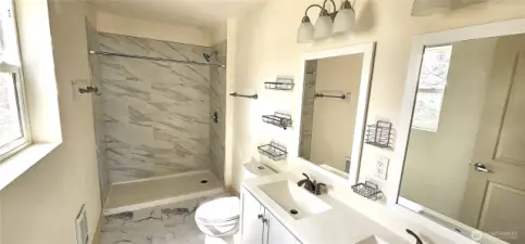 Primary bath with tiled shower