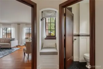 Kitchen circles back to the formal entry and powder room