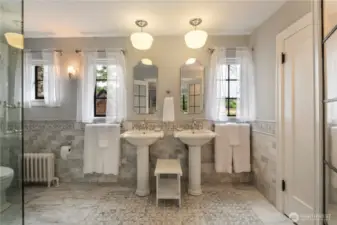 Intricate Cararra Marble tile throughout primary bath