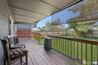 Back porch is the length of the home and is totally covered.