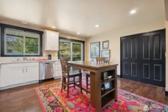Washer and dryer conveniently hidden behind beautiful doors.