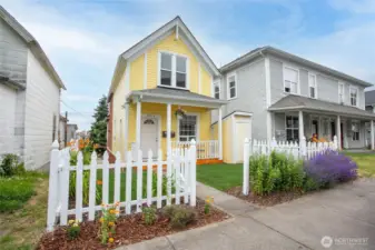 You'll enjoy this fully remodeled home featuring fresh landscaping, a brand-new front porch, and an adorable white picket fence!