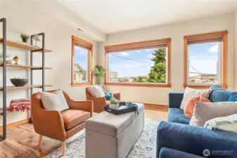 Fresh paint and newly cleaned windows fill the space with warm, natural light.