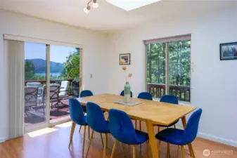 A sliding glass door opens to the deck, effortlessly blending indoor comfort with outdoor living