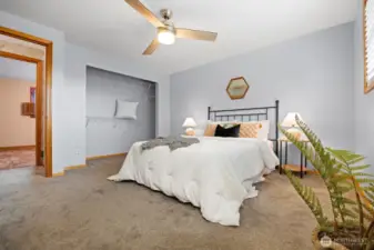 The primary bedroom is very spacious and has a large closet.