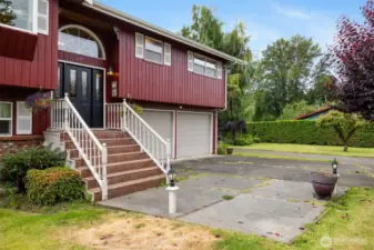 Another view of the front entry and all the off street parking area.