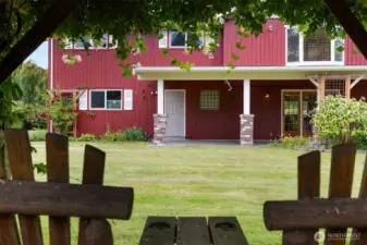 Looking from the swing to the rear elevation of the home.