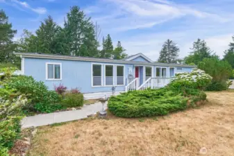 Spacious doublewide situated on a rare double lot—plenty of room to tinker, garden, and play.