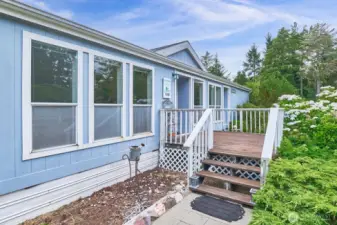 Welcoming east-facing front porch - a great place to start the day!
