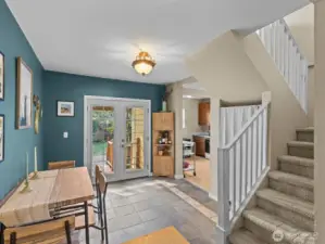 You'll pass through the dining area on your way to the kitchen.