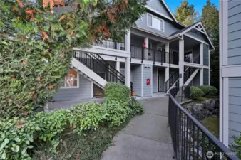 Welcome to Emily Lane Townhomes  A quaint community of 24 Townhome Style Dwellings     UNIT A #201  (1st of 3 Buildings)  Each Three  Story Building offers 4 One level units on the main floor  & 4 Townhome Style  (2 Floors )