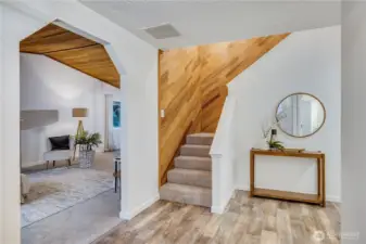 Upon entry to the home, you're greeted by a stylish foyer and charming features.