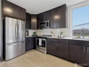 Your plants will love the sunny window over the kitchen sink