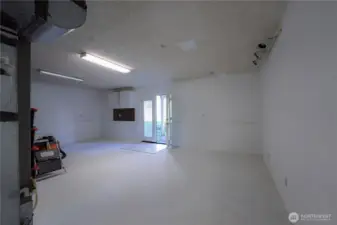 A spacious rec room, an entertainer's dream: room for games, billiards and a home theater ~ all in one!