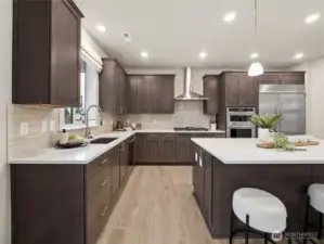 Check out all the cabinet space.  Photo is representational. Actual home is under construction and finishes and colors will vary. See site agent for details.