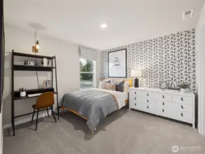 Spacious spare bedroom with walk-in closet. Photo is representational. Actual home is under construction and finishes and colors will vary. See site agent for details.