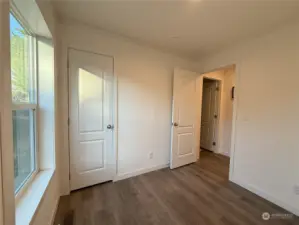 2nd bedroom looking into hallway.