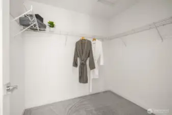Step into a walk-in closet, a mini boutique waiting for your wardrobe! With ample shelving and hanging space, the organization has never looked this good.