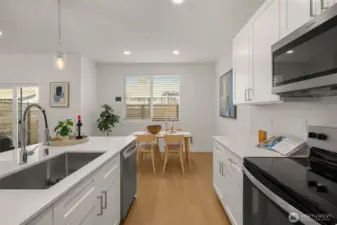 Seamless flow from kitchen to dining—because every meal deserves the perfect ambiance.