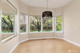 Dining area adjoining kitchen with great views to the private backyard.