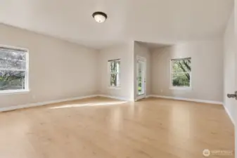 Primary bedroom, split bedroom floor plan, private, spacious oasis.  Room for sitting area.  Access to private covered patio.