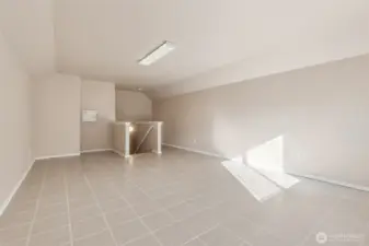 Bonus room over garage.  Access from laundry room.