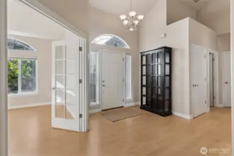 Generous study, natural light, French glass doors. Front entry to the home.