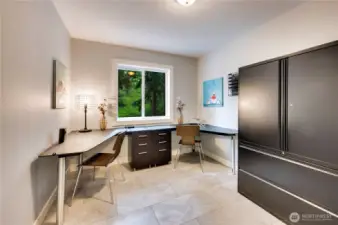Main floor office. Customized furniture is included in this sale.