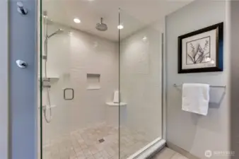 Large shower in primary also has a sylvan view.