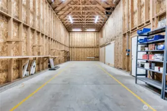 RV bay. Shelves to the right contain extra paint, tiles etc.