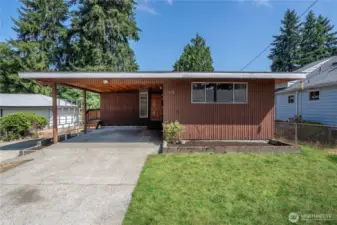 The Durden home offers an extraordinary opportunity. This Mid Century rambler with a basement is over 2600 sq ft with room to expand and to build, multiplying your equity each step of the way.