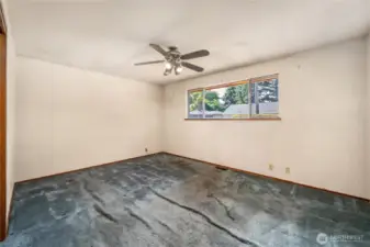 Primary bedroom can easily accommodate a king sized bed.