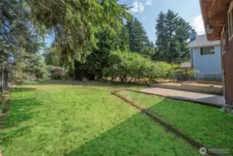 Backyard is fenced and relatively level.