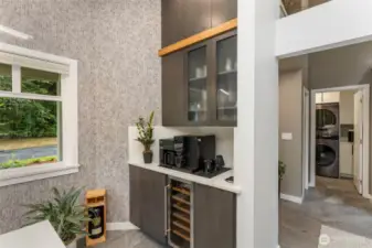 Morning coffee or happy hour? This unique nook with wine refrigerator keeps everything close at hand.