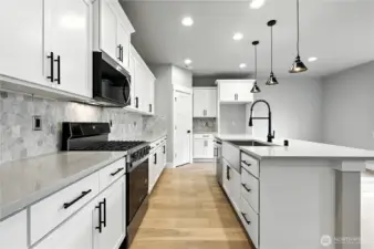 photo of  completed home on another lot.