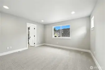 photo of  completed home on another lot.