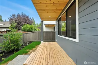 Covered Deck  photo of  completed home on another lot.