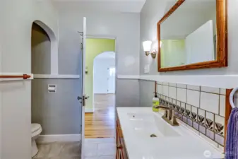 Viewing out of the bathroom. Toilet  privately tucked away in alcove.