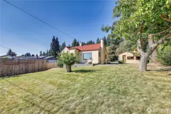 Imagine the possibilities you could do with this backyard! Picnic, garden, play croquet or badminton or sit under a tree with a good book and take a nap!