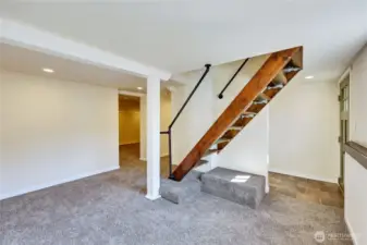 There are also stairs in the basement leading up to the main floor.