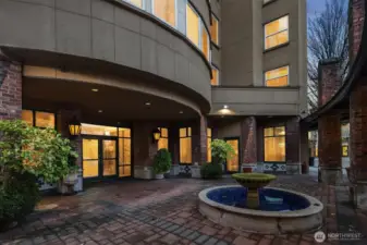 Inviting entry into lobby.