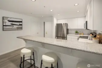 Comfortable bar counter seating for your morning coffee or casual meals.