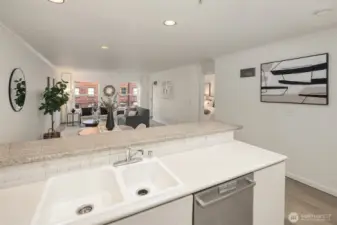 The elevated bar counter is perfect for an appetizer spread or buffet meal when entertaining.