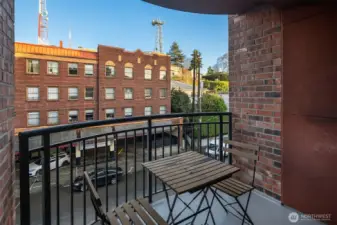 This quaint and private balcony is a lovely place to get some fresh air or some evening unwinding.