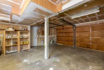 Spacious two-car garage offering plenty of storage for tools, gear, and more.