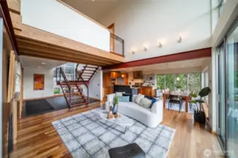 This stunning contemporary design utilized modern architecture while playing with older exposed beam-work for the lofted space. The striking staircase is a functional sculptured centerpiece with Kemas hardwoods inlaid with walnut.